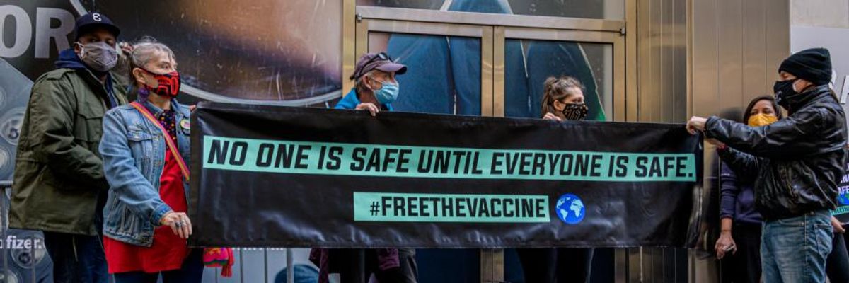 Health justice advocates demonstrated outside Pfizer's headquarters in Manhattan on March 11, 2021. (Photo: Erik McGregor/LightRocket via Getty Images)