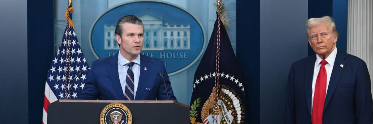 Hegseth and Trump in briefing room