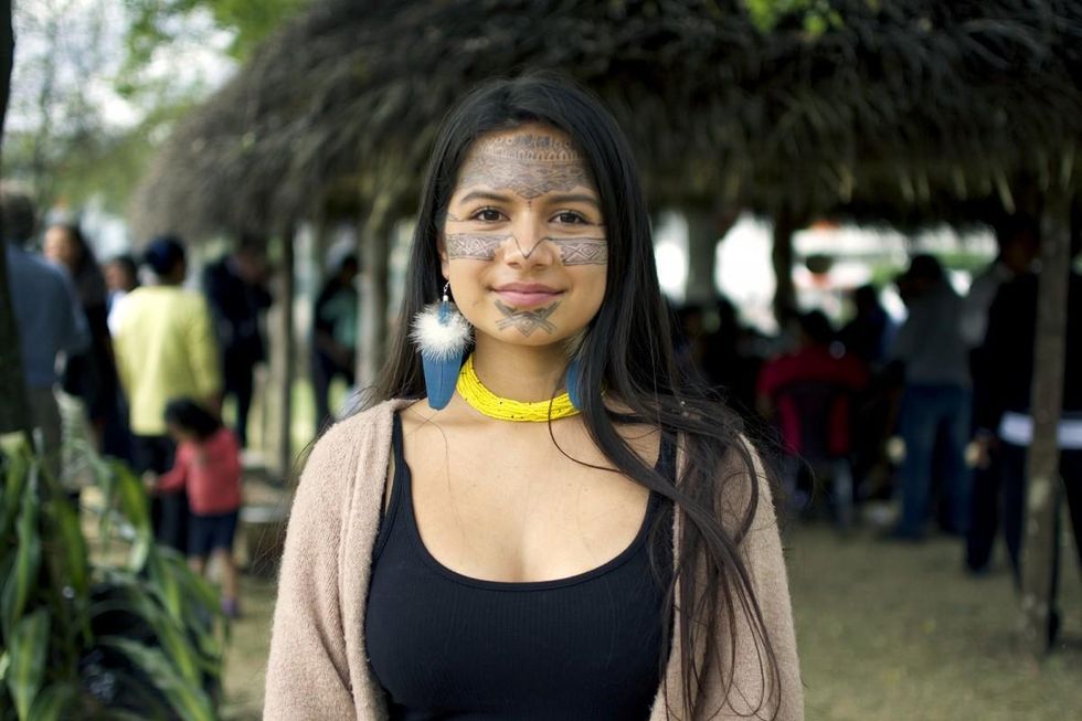 Helena Gualinga at the launch of the historic Kawsak Sacha 'Living Forest' Declaration by her community of the Kichwa Pueblo of Sarayaku in the Ecuadorian Amazon. The ultimate goal of the Kawsak Sacha Declaration is to protect Indigenous lands and recognize the inseparable physical and spiritual relationship between the Peoples of the Living Forest, and all of the beings that inhabit and compose it. (Photo: Sophie Pincetti for WECAN International)