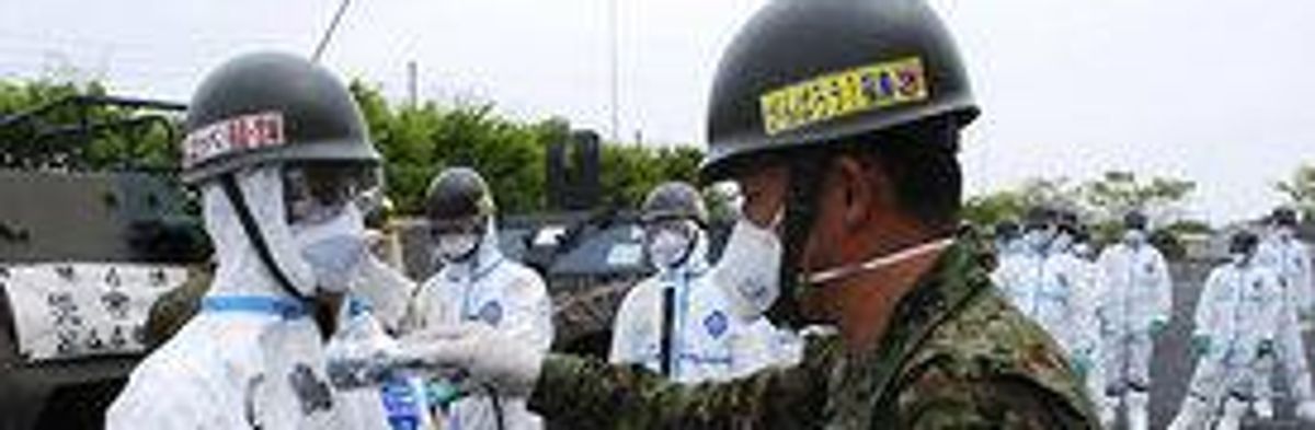 Japanese Nuclear Workers Enter Fukushima Reactor