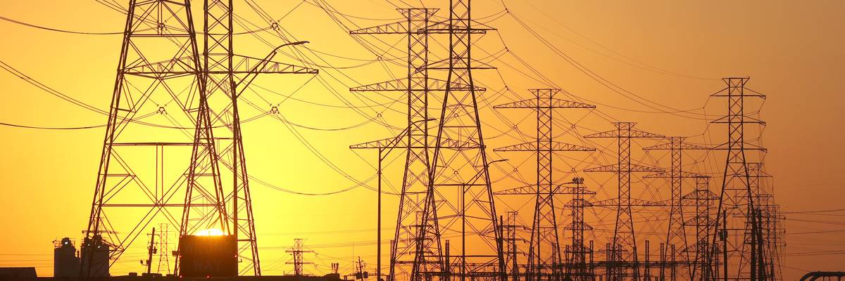 High voltage transmission towers are seen in Houston on February 21, 2021, in the wake of a deadly winter storm that left millions of Texans without power.