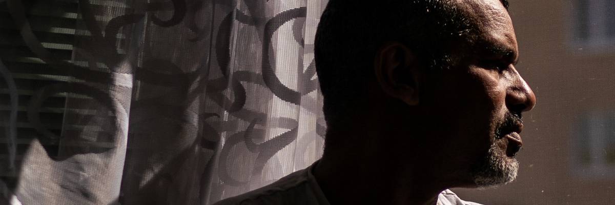 Hisham Bin Ali Bin Amor Sliti, a former Guantánamo prisoner from Tunisia, is photographed at his apartment