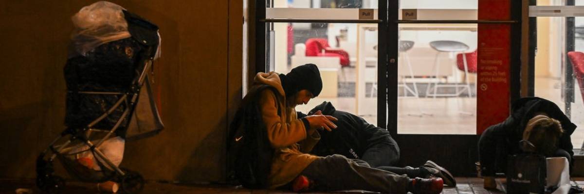 Homeless people in heavy rain in San Francisco