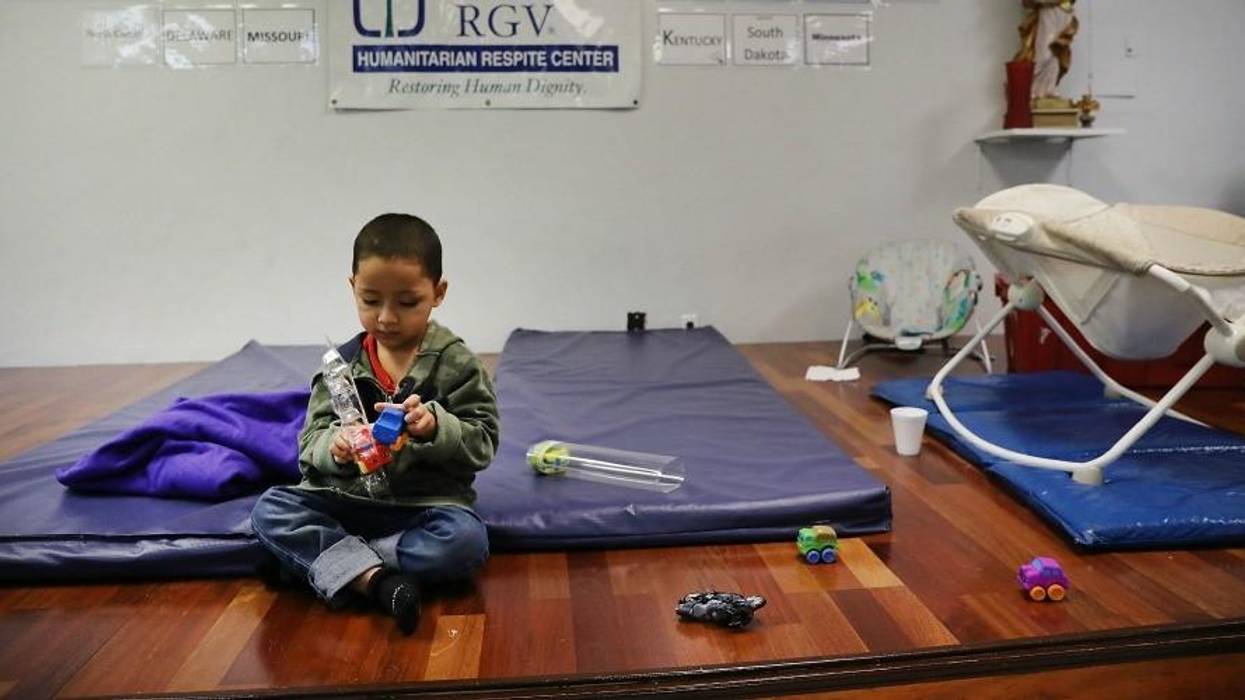 Honduran child plays after crossing border.