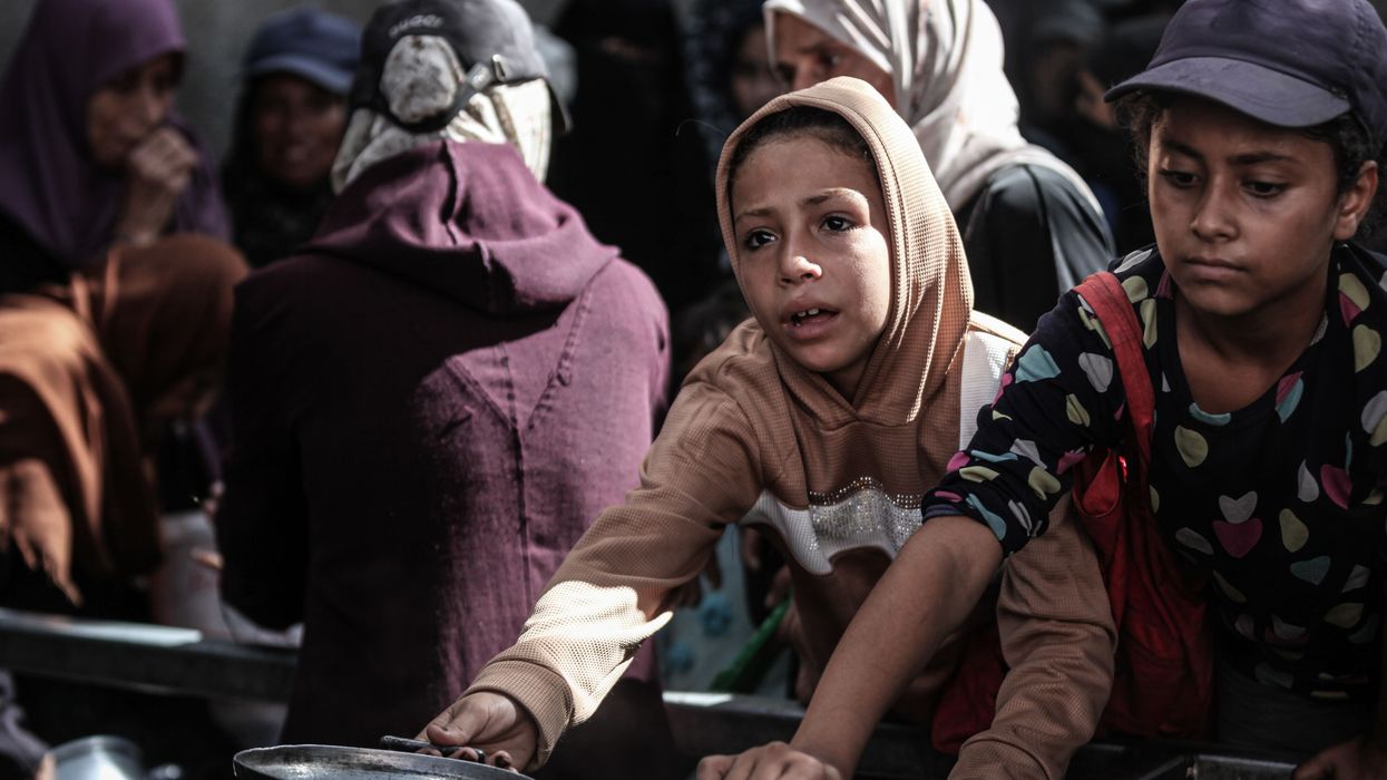 Hot meal distributed to Palestinians struggling with hunger in Gaza