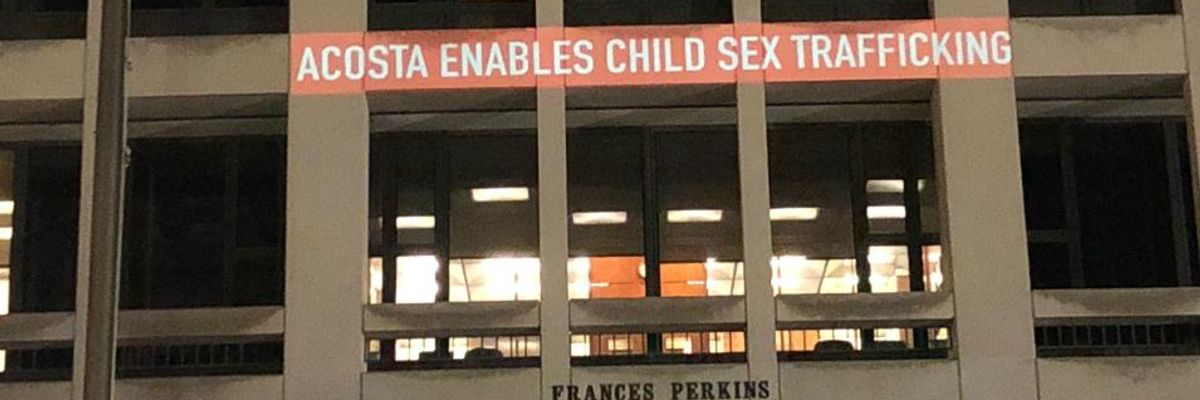 'Acosta Enables Sex Trafficking' Projected Onto Department of Labor Building as Resignation Demands Grow