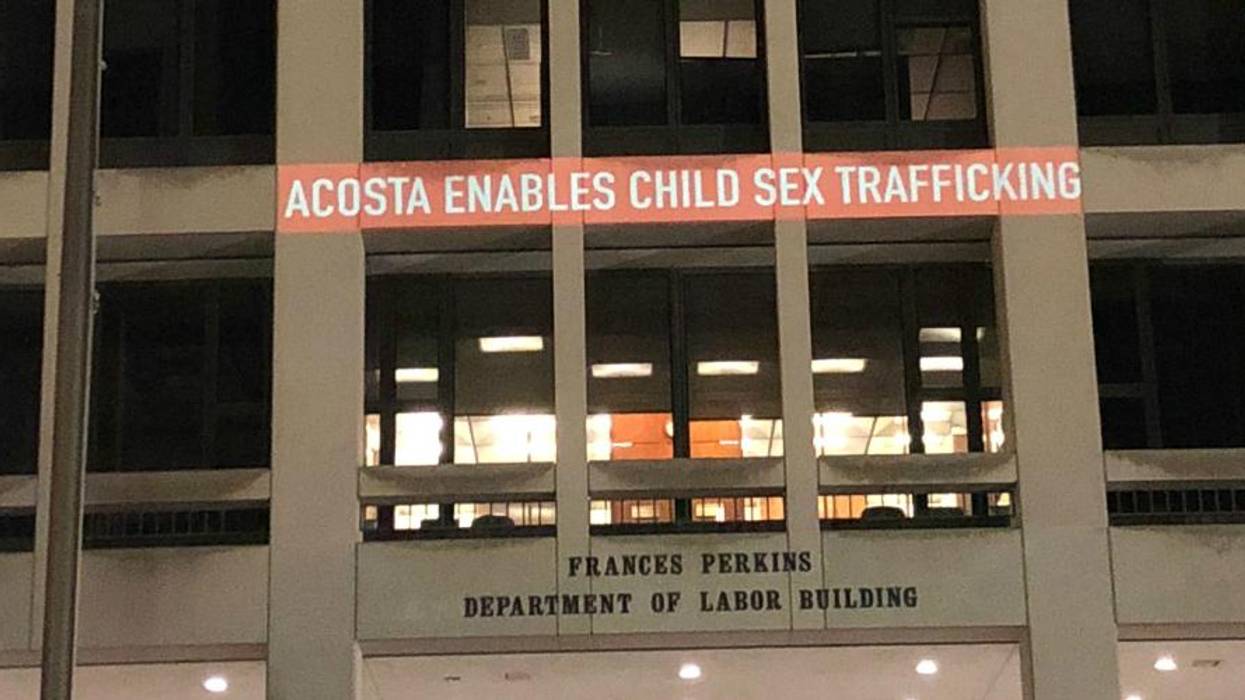 'Acosta Enables Sex Trafficking' Projected Onto Department of Labor Building as Resignation Demands Grow