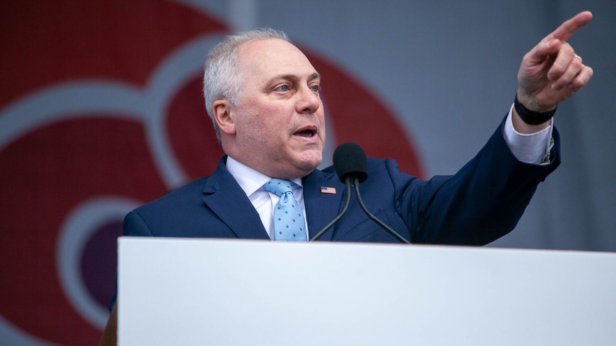 House Majority Leader Steve Scalise in a blue suit pointing