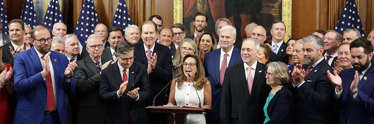 House Republicans celebrate after passing Medicaid cuts