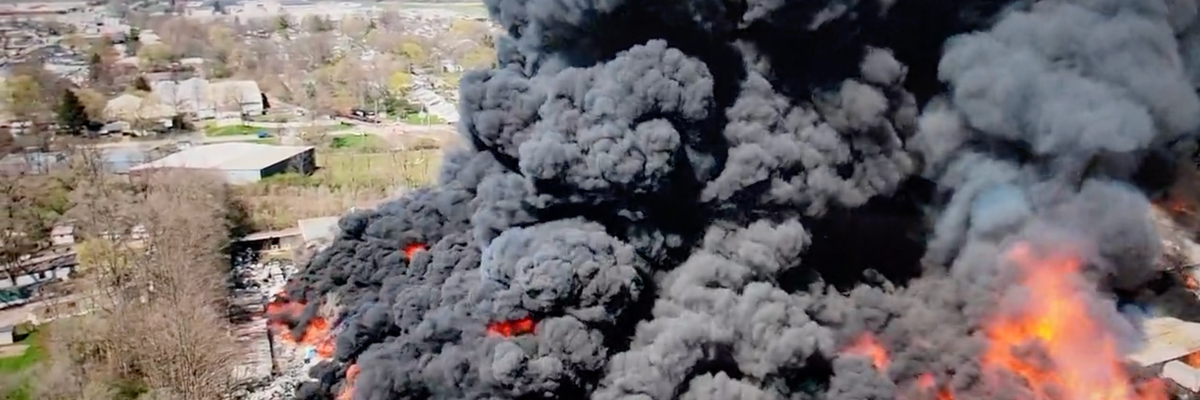 ​Huge clouds of black smoke from a fire 