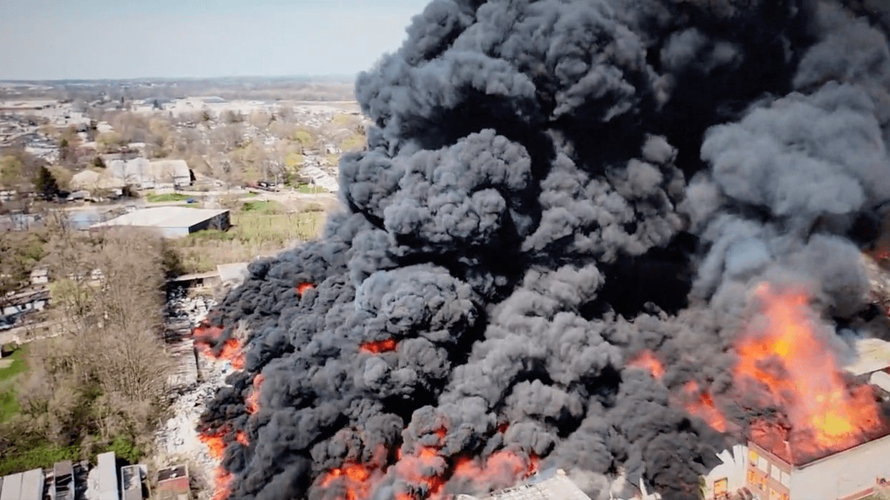 Huge clouds of black smoke from a fire