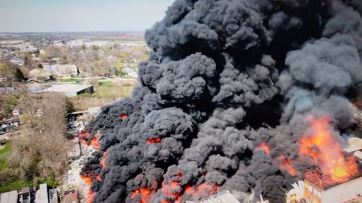 Huge clouds of black smoke from a fire