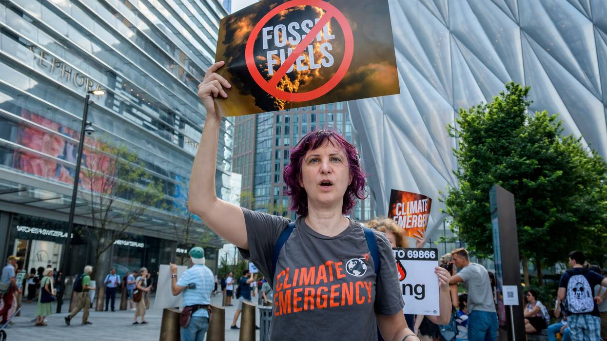 Hundreds of climate activists gathered outside the CNN studios
