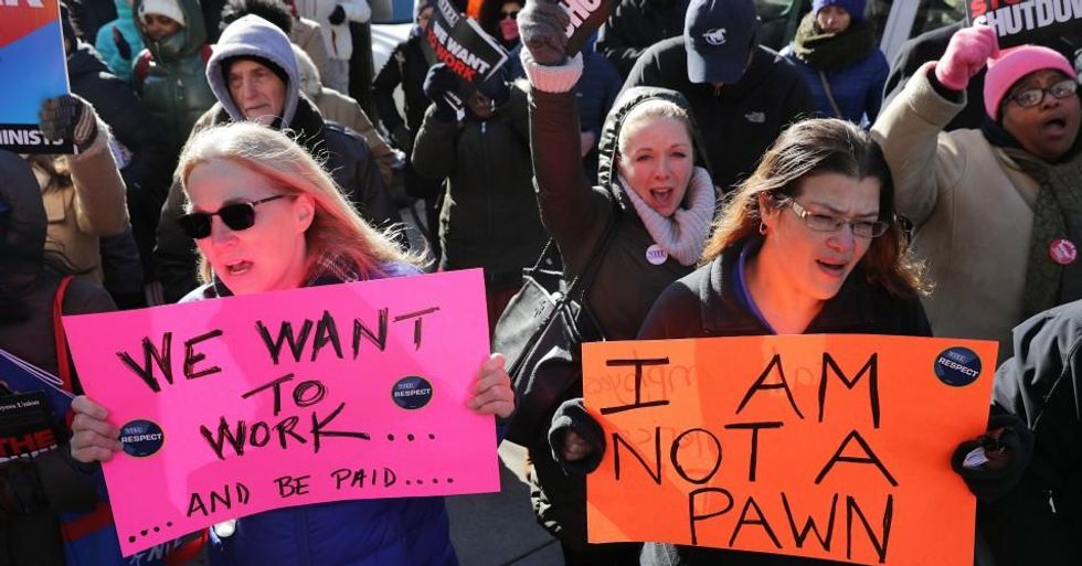 Hundreds of federal workers and contractors rallied against the partial federal government shutdown outside the headquarters of the AFL-CIO Jan. 10, 2019 in Washington, D.C. (Photo: Chip Somodevilla/Getty Images)