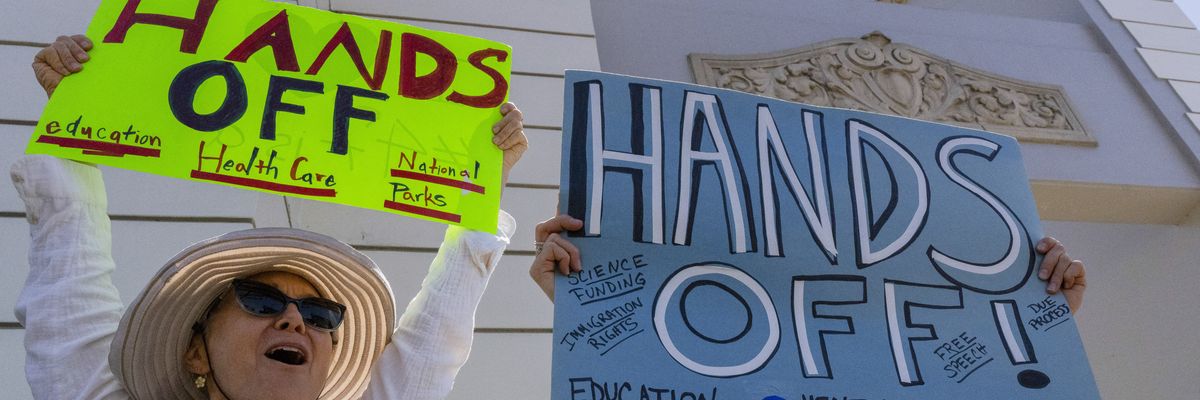 Hundreds of people demonstrate in Los Angeles to protest President Trump's policies