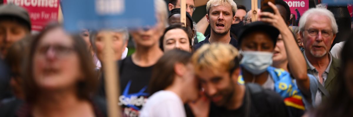 Hundreds of people gather outside the U.K. Home Office in London on June 13, 2022 to protest Prime Minister Boris Johnson's plan to deport some asylum-seekers to Rwanda.
