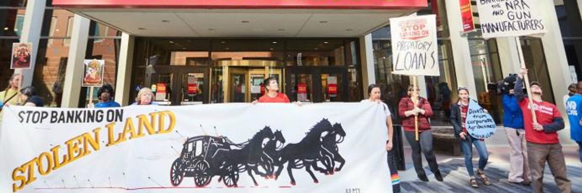 Targeting Shareholders Meeting, Protesters Say 'Time Is Up for Wells Fargo's Shady Dealings'
