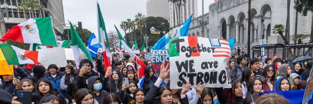 Hundreds of protestors gather outside Los Angeles City Hall and march to protest President Trump's illegal immigration policy