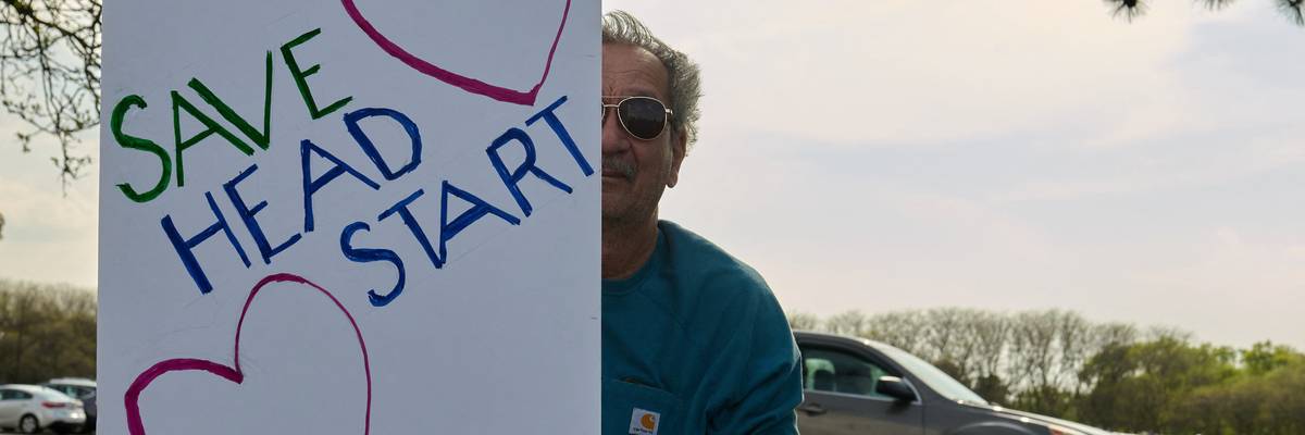 Hundreds protest outside a rally held by U.S. President Donald Trump