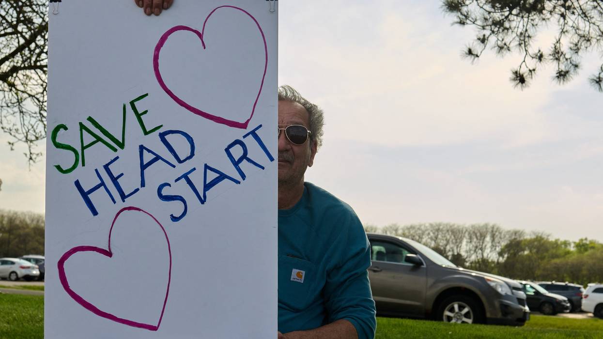 Hundreds protest outside a rally held by U.S. President Donald Trump