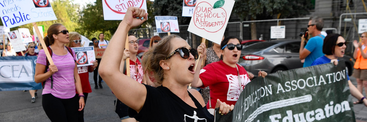 Defending Public Schools, Demonstrators Greet Betsy DeVos at ALEC Annual Meeting