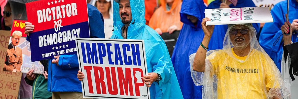 Hundreds rally for impeachment