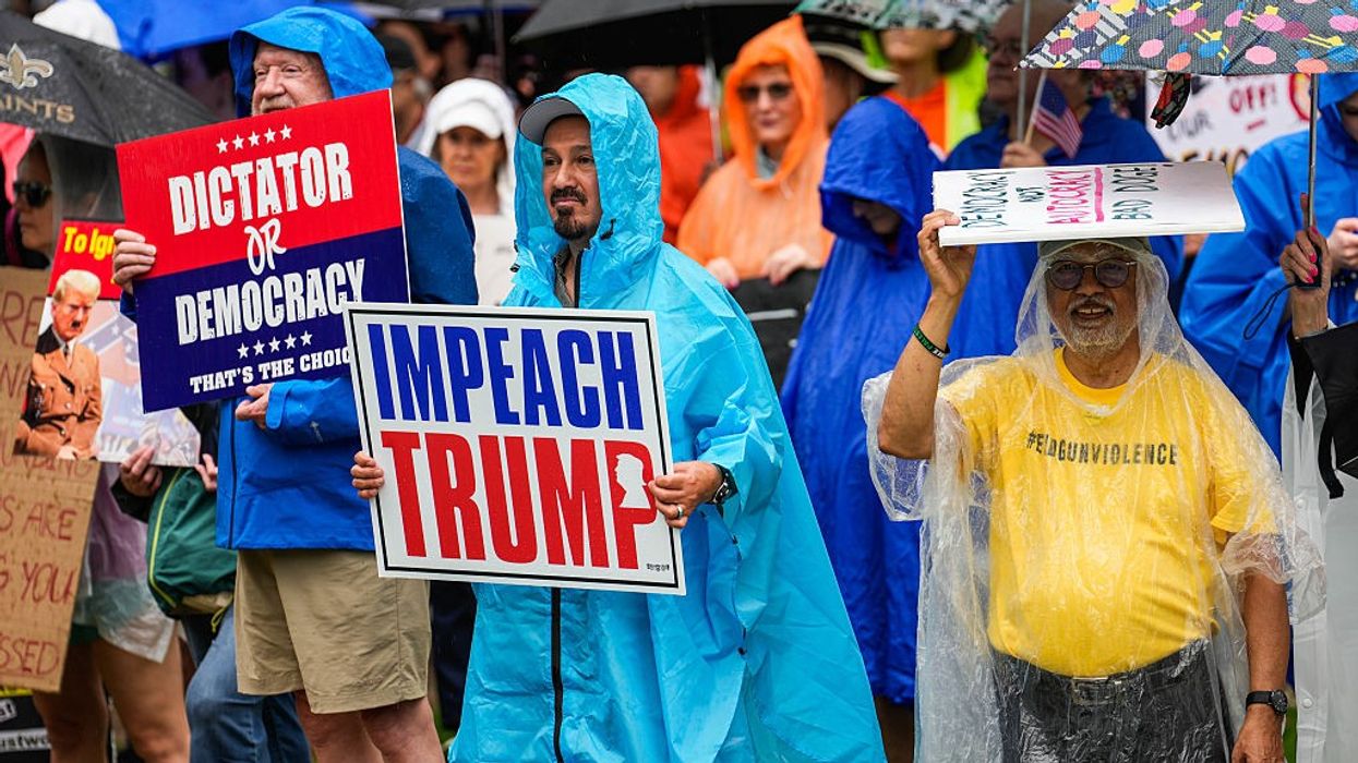 Hundreds rally for impeachment