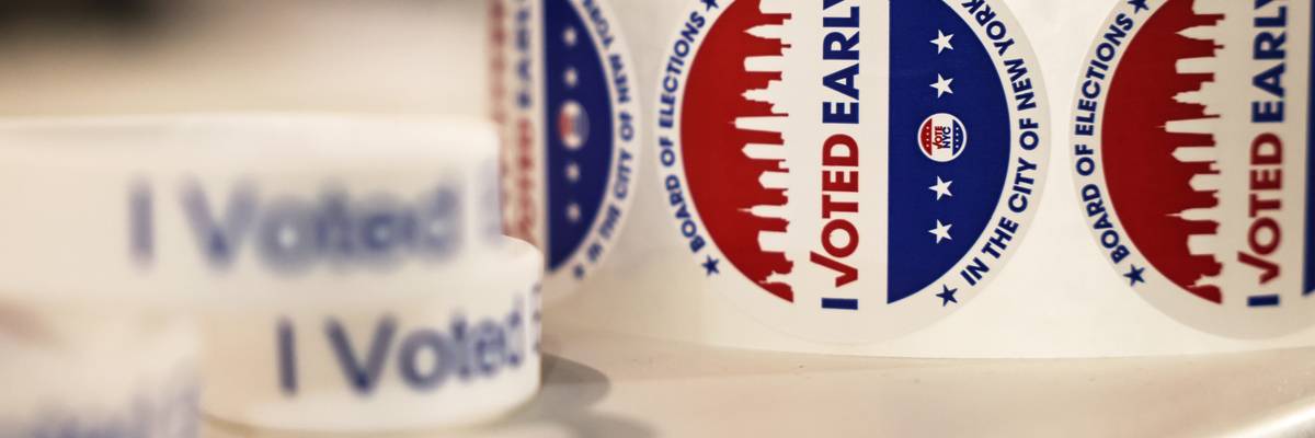 "I voted" stickers are shown.