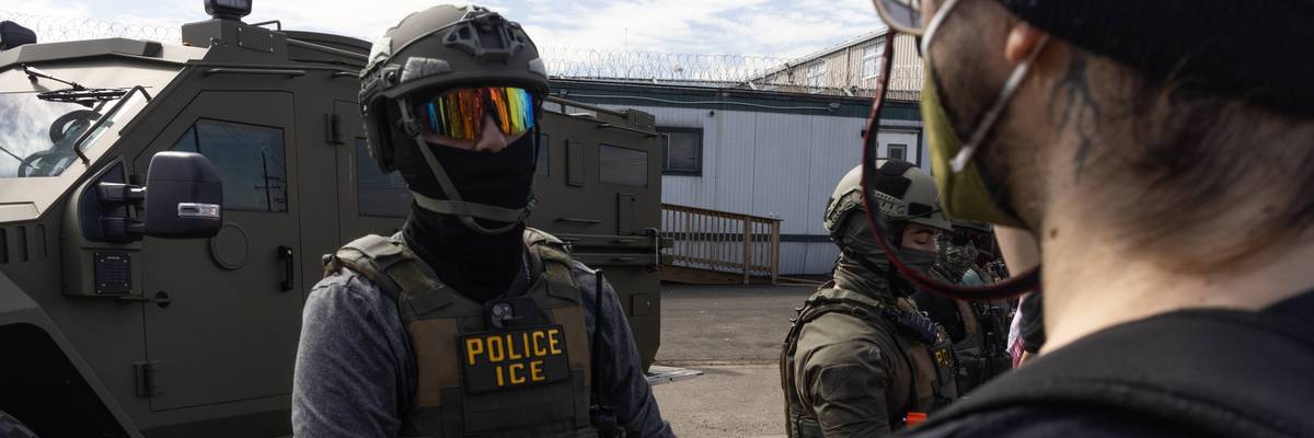 ICE agents and immigration activists face off outside Delaney Hall detention center in Newark, New Jersey