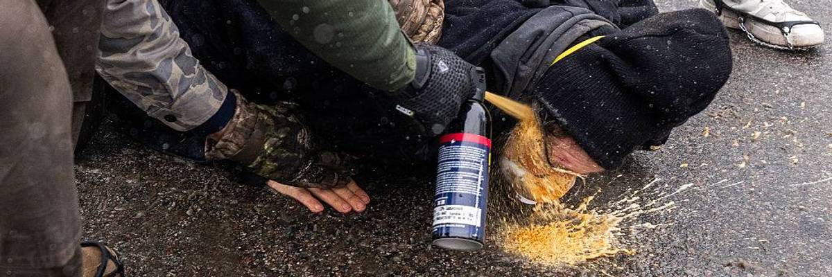 ICE Brutality pepper-spray to face in Minneapolis