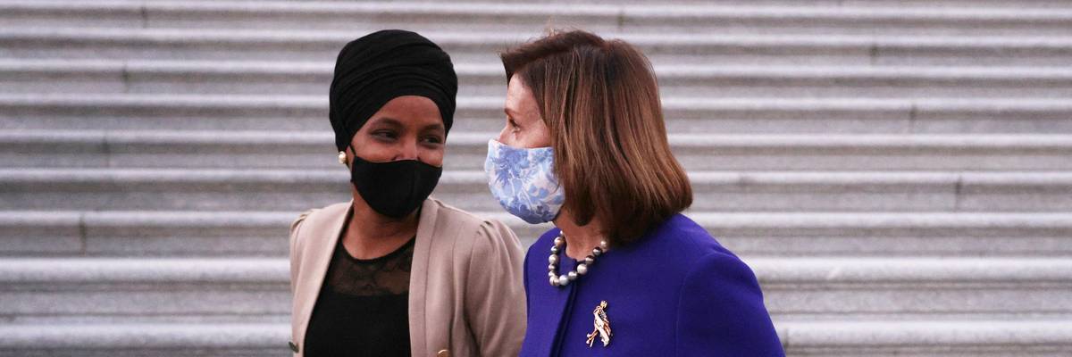 Ilhan Omar walking with Nancy Pelosi