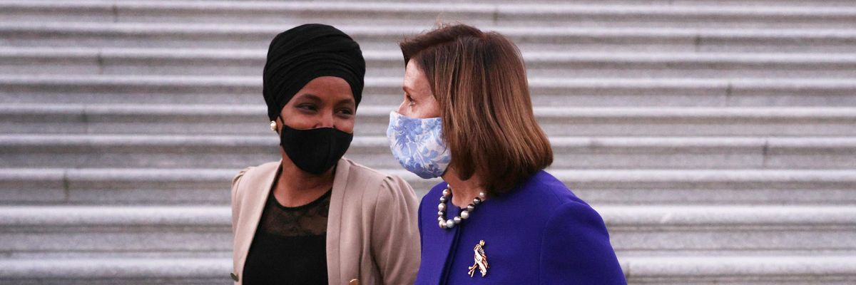 Ilhan Omar walking with Nancy Pelosi