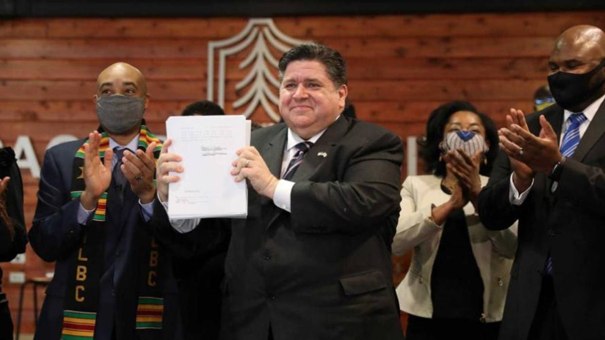Illinois Gov. JB Pritzker with cash bail reform legislation.