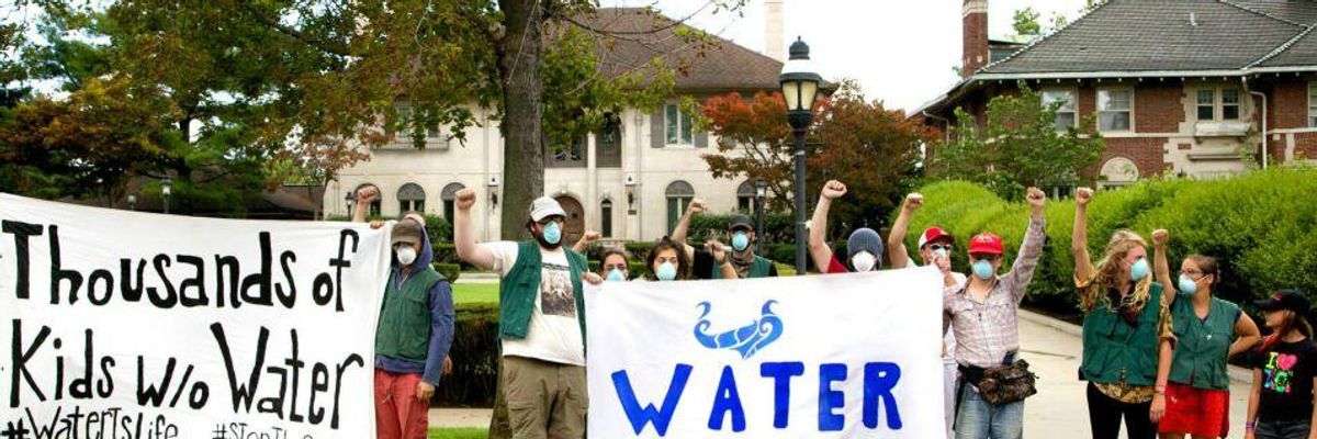 In Midst of Shutoffs, Protesters 'Liberate' Water from Detroit Mayor's Mansion