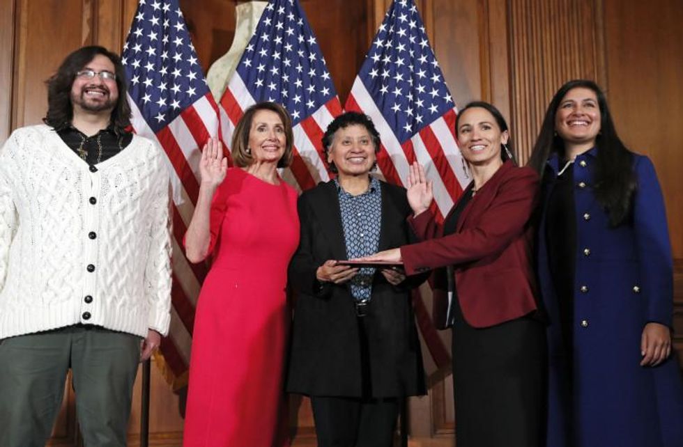 Image: Nancy Pelosi during a ceremonial swearing-in with Rep. Sharice Davids on Capitol Hill on Jan. 3, 2019.