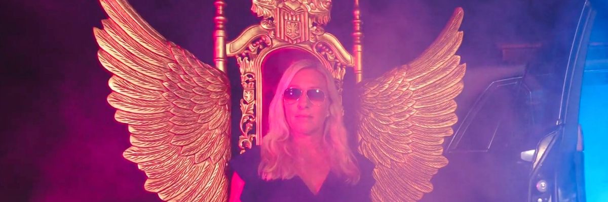 Image of Marjorie Taylor Greene on golden winged throne in new rap video