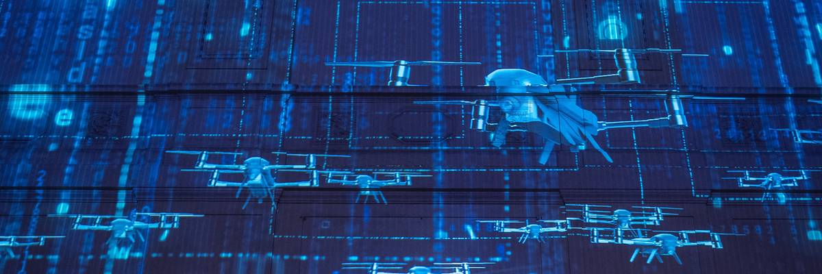 Images are projected onto a wall shows drones