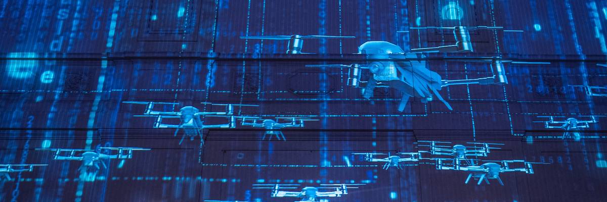 Images are projected onto a wall shows drones