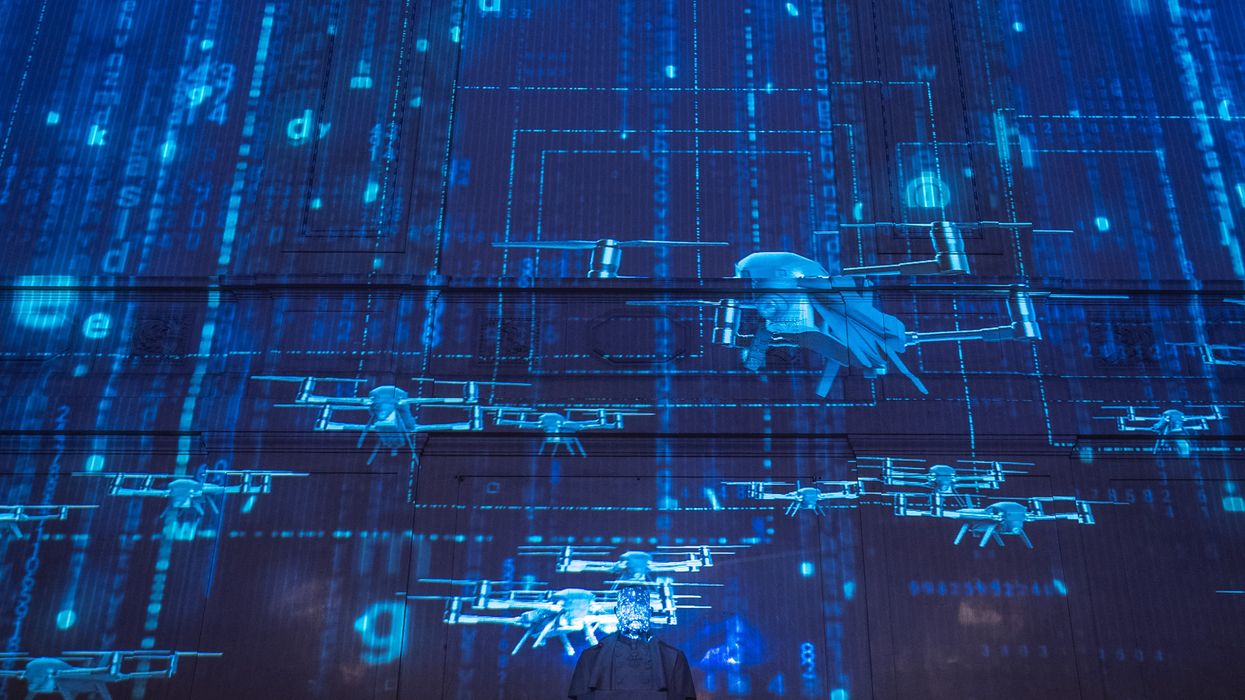 Images are projected onto a wall shows drones