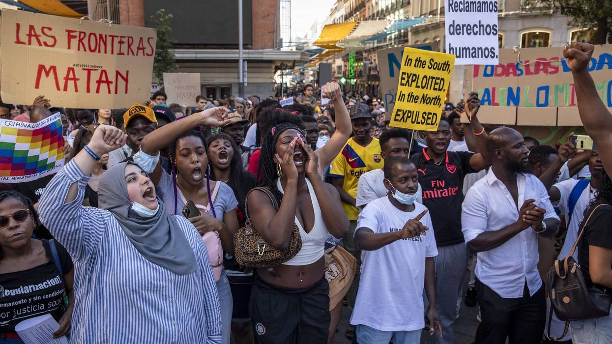 Immigrants and supporters rally in Madrid