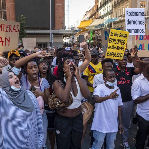 Immigrants and supporters rally in Madrid