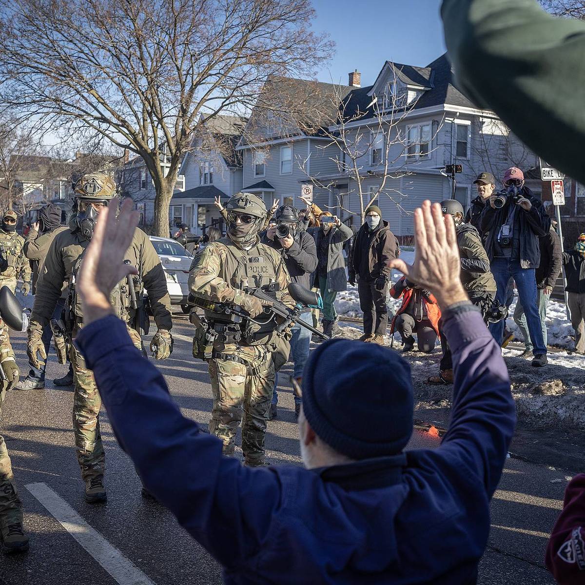 Immigration and Customs Enforcement (ICE) agents and protester interaction, Minneapolis, January 2026