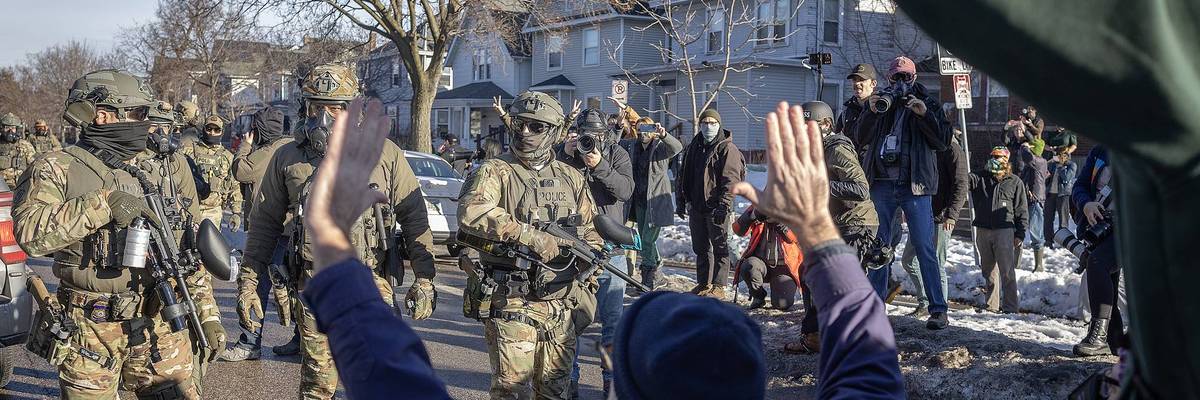 Immigration and Customs Enforcement (ICE) agents and protester interaction, Minneapolis, January 2026