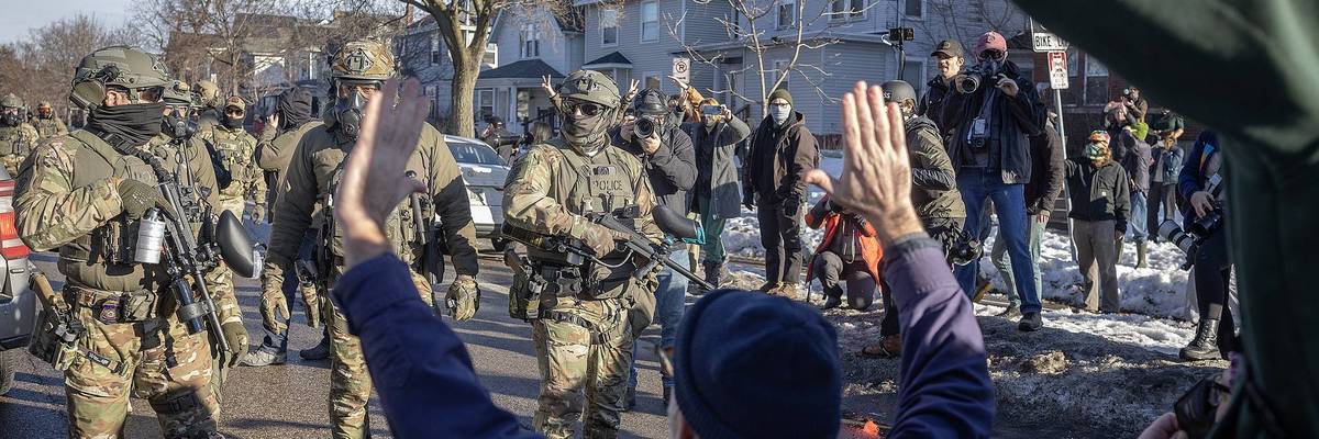 Immigration and Customs Enforcement (ICE) agents and protester interaction, Minneapolis, January 2026