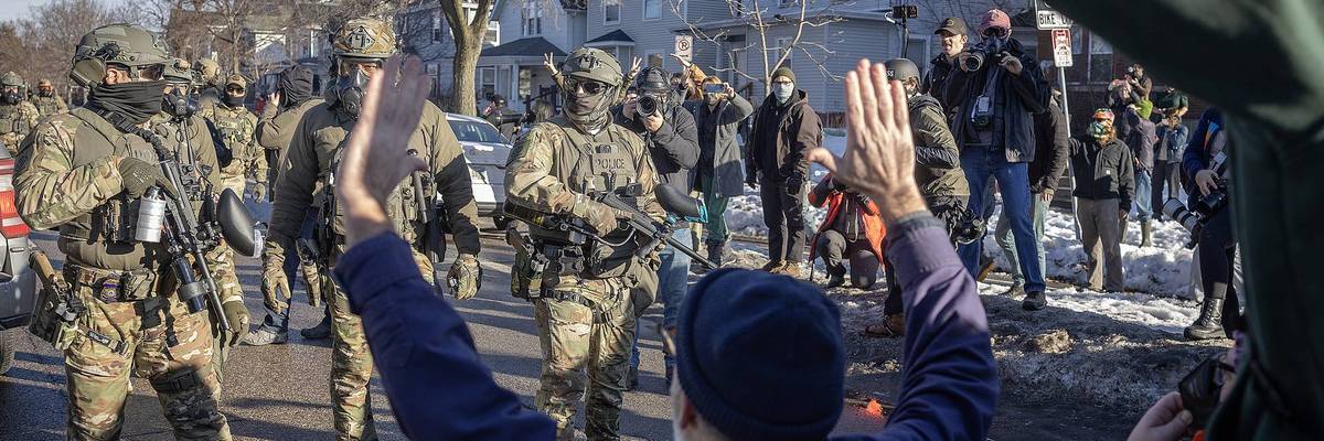 Immigration and Customs Enforcement (ICE) agents and protester interaction, Minneapolis, January 2026