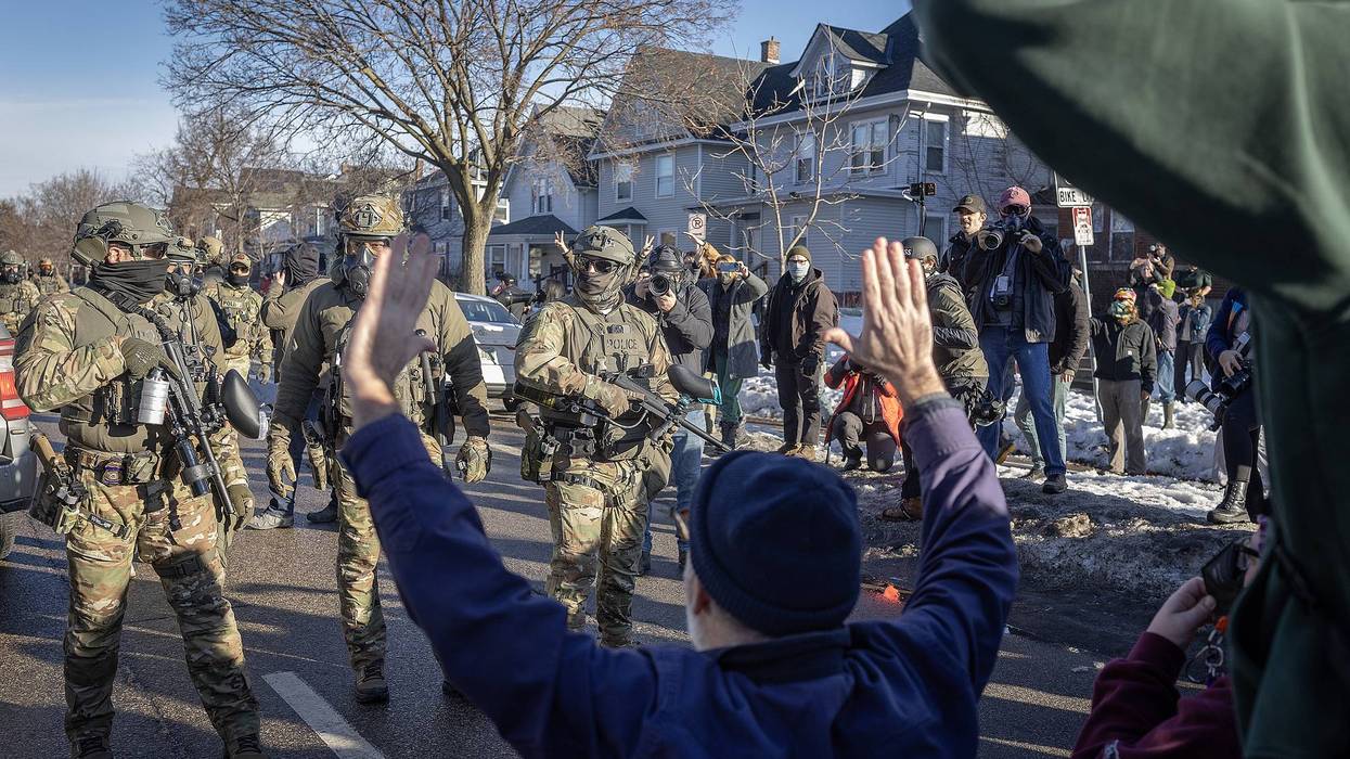 Immigration and Customs Enforcement (ICE) agents and protester interaction, Minneapolis, January 2026