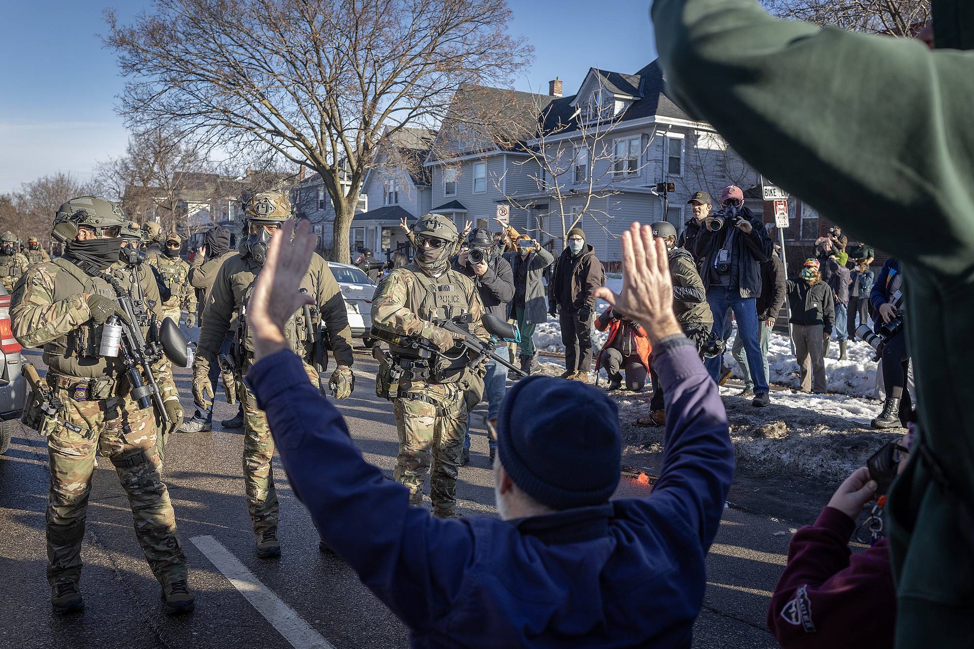 Immigration and Customs Enforcement (ICE) agents and protester interaction, Minneapolis, January 2026