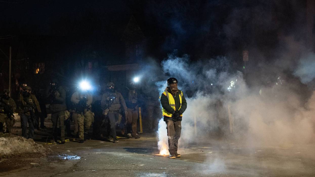 Immigration and Customs Enforcement (ICE) agents and protestors in Minneapolis, January 2026