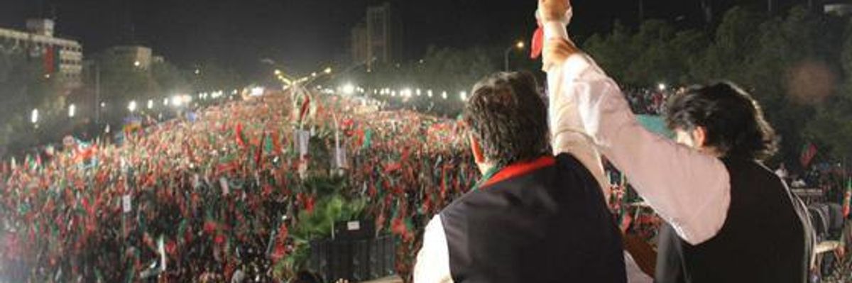 Imran Kahn supporters stretched out for kilometers Thursday evening, May 9, 2013 in Islamabad, Pakistan