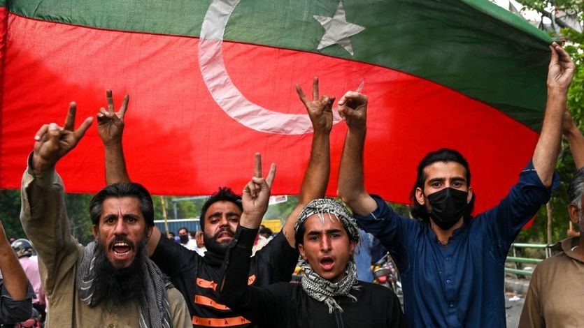 Imran Khan supporters celebrate.
